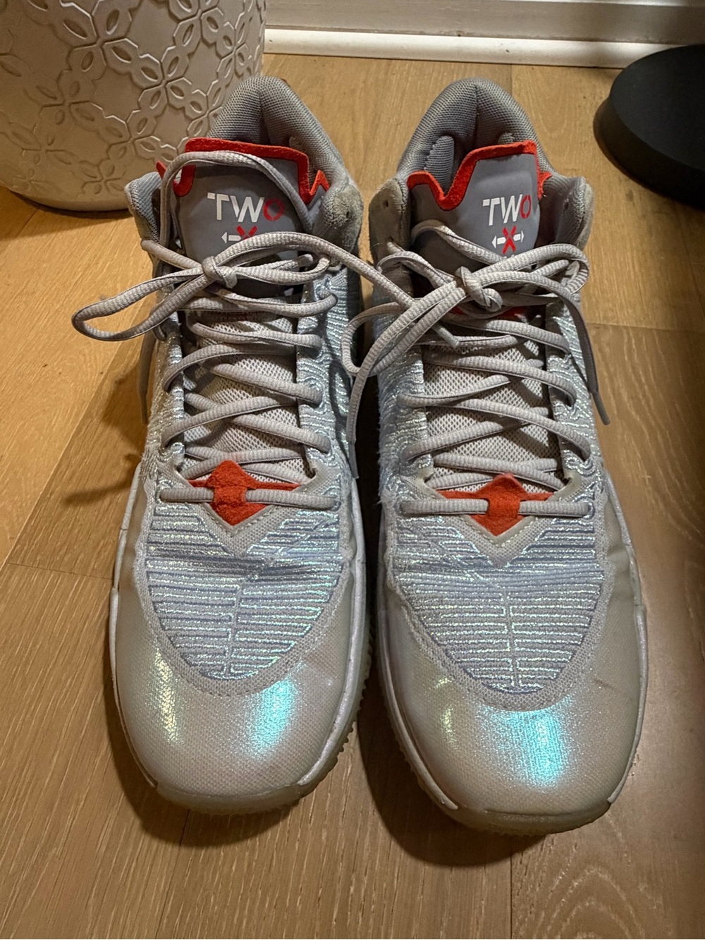 New Balance Silver Sneakers with Red Accents